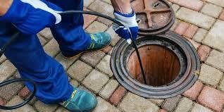 a technician cleaning the sewer by Hydro Jetting